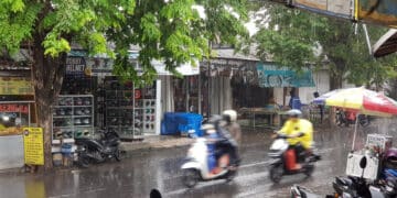 Is Bali Too Rainy In December - raining on Jalan Raya Canggu in wet season in Bali.